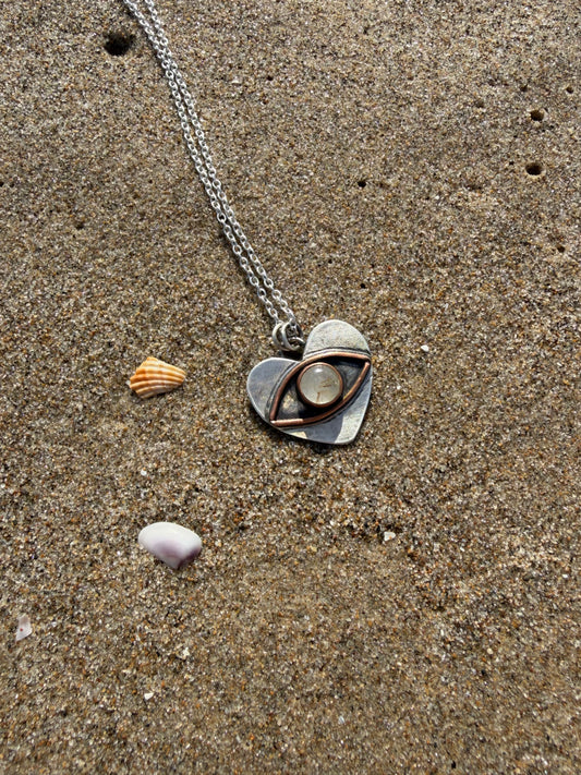 Eye heart pendant