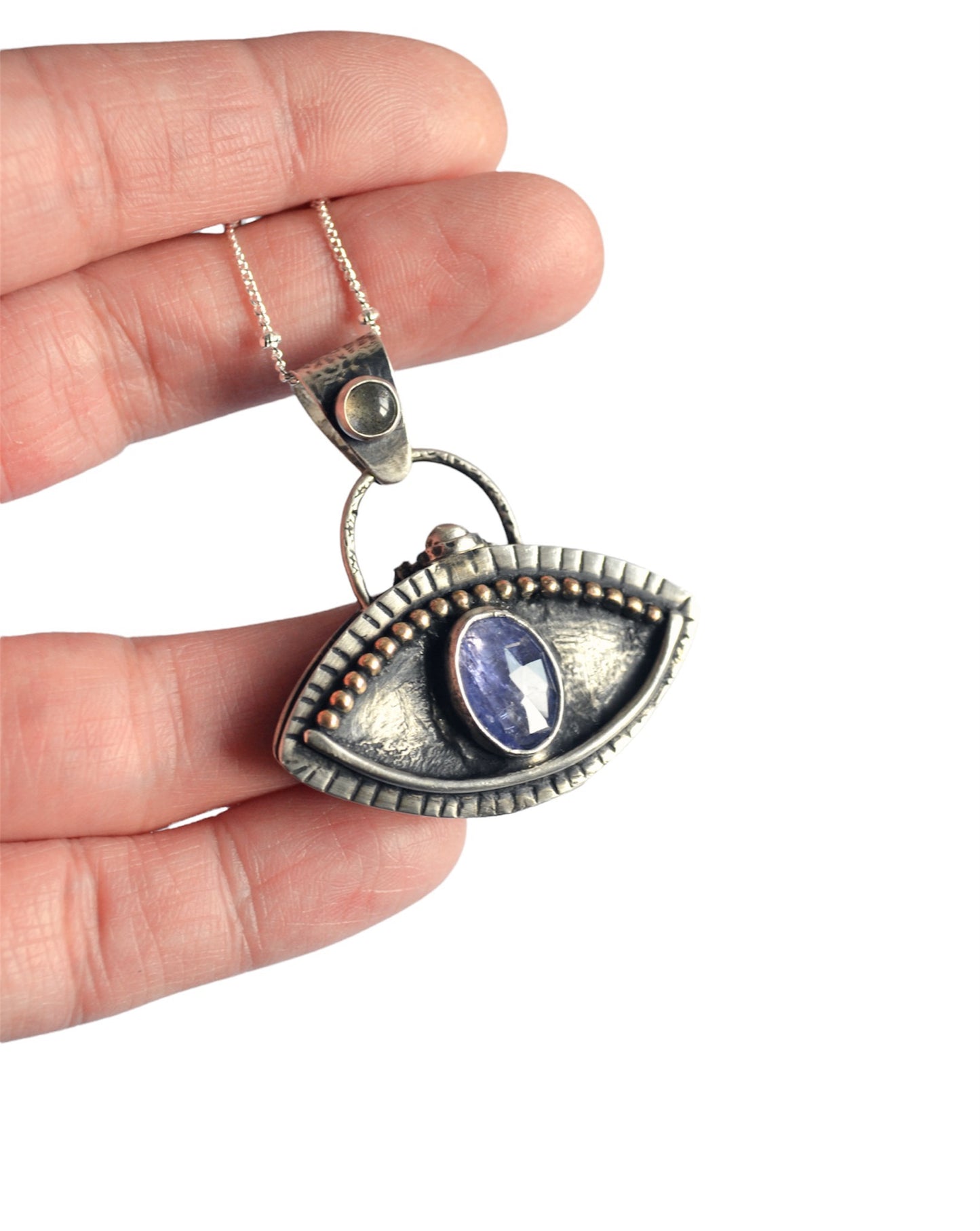 Reserved Eye locket
