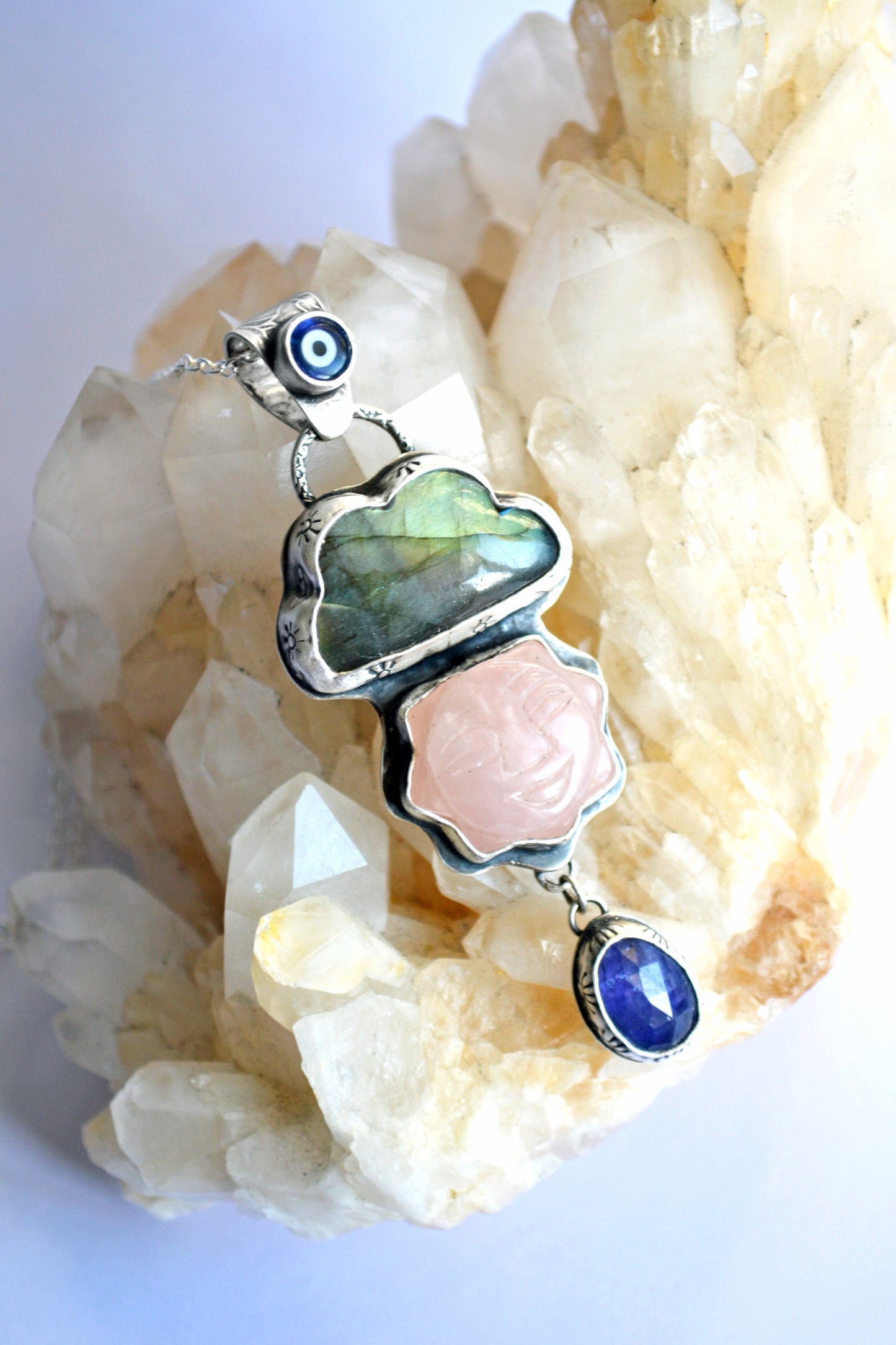 Sun and cloud pendant