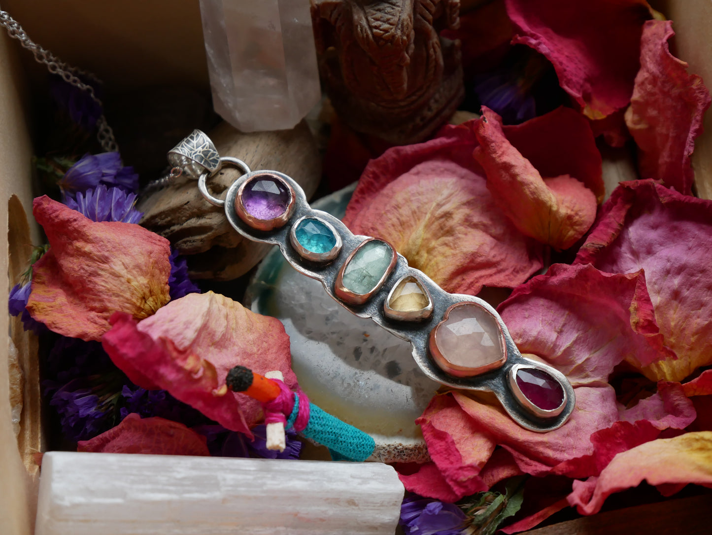 She's a rainbow pendant