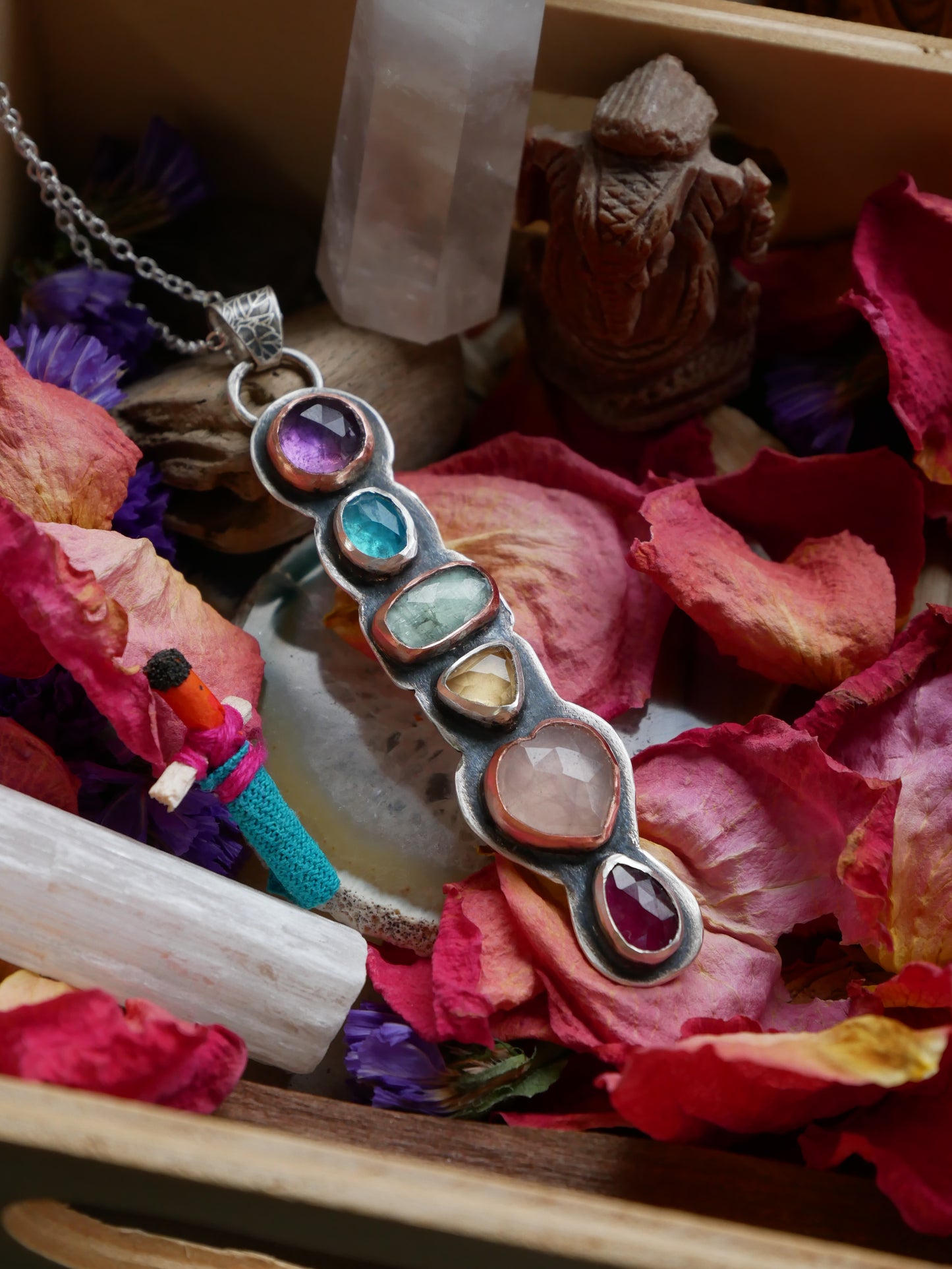 She's a rainbow pendant