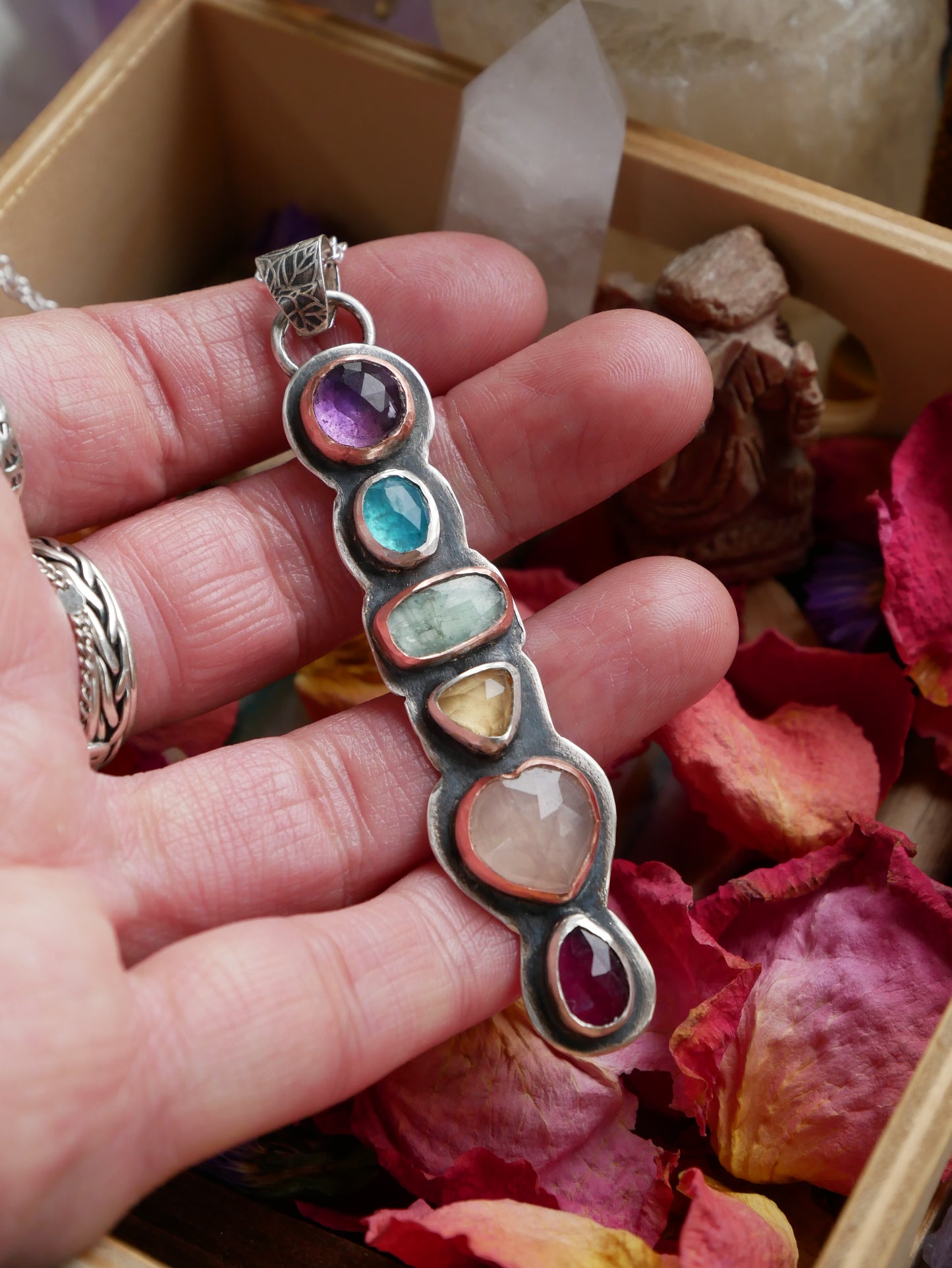 She's a rainbow pendant