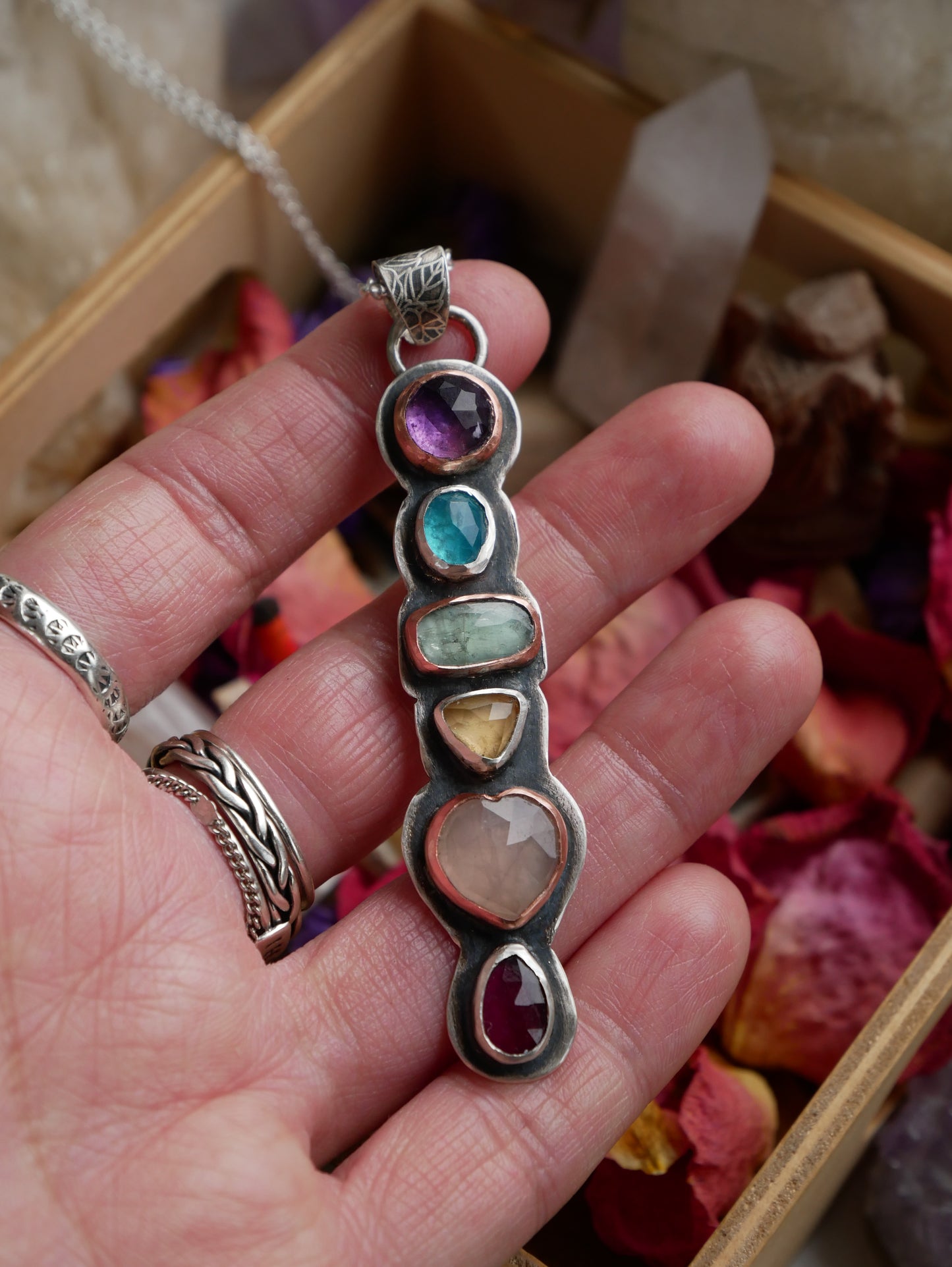 She's a rainbow pendant