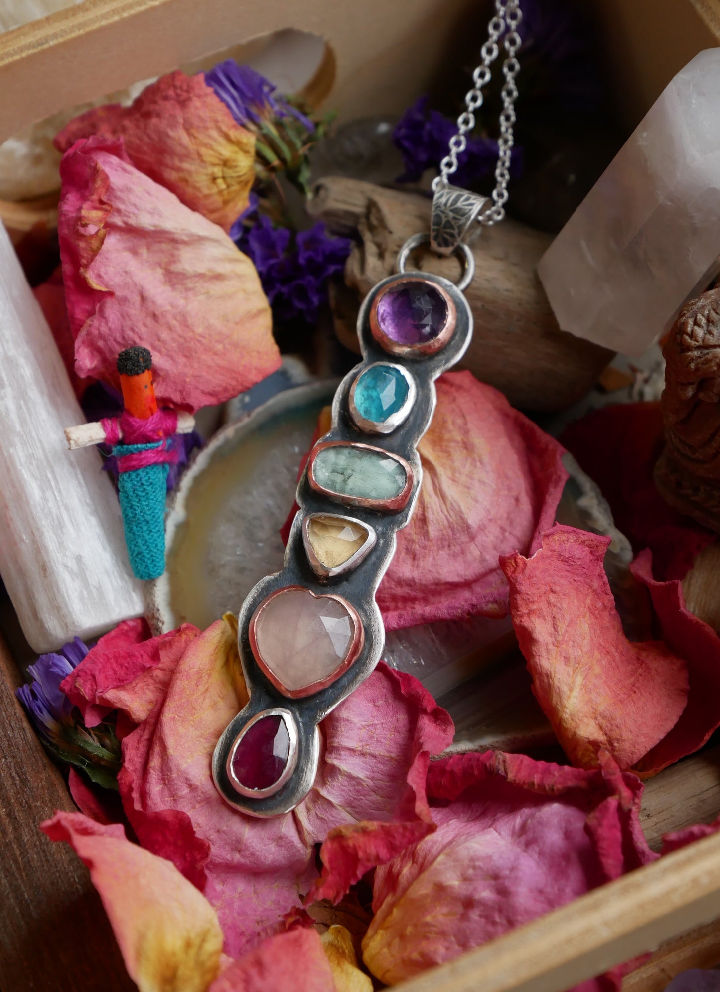 She's a rainbow pendant
