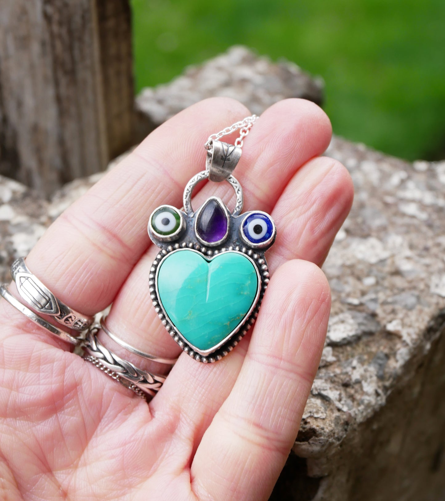 Let love rule turquoise pendant