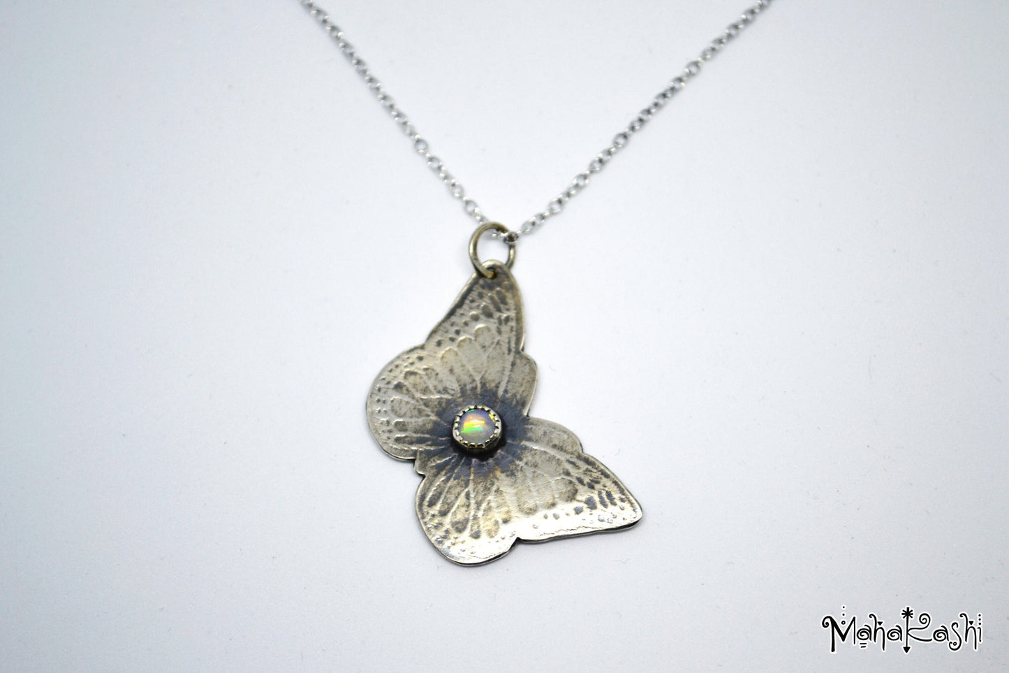 Butterfly pendant with Ethiopian Opal