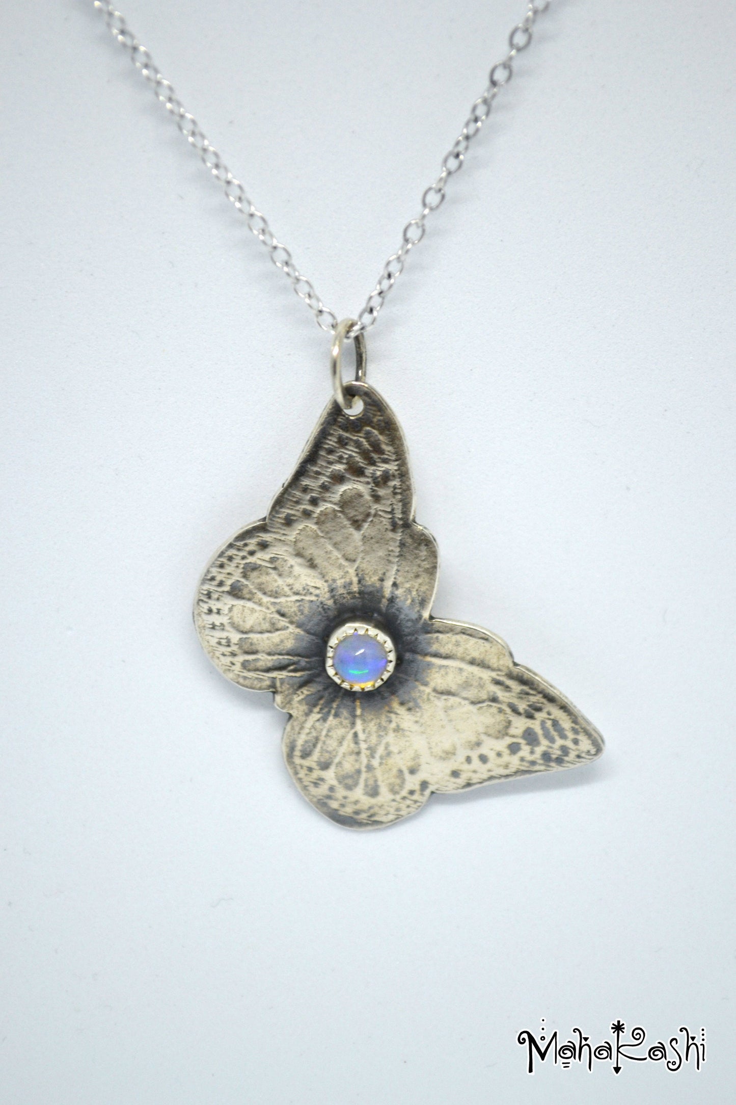 Butterfly pendant with Ethiopian Opal