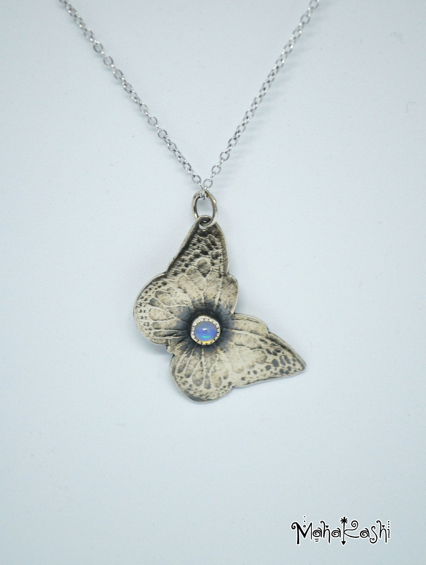 Butterfly pendant with Ethiopian Opal