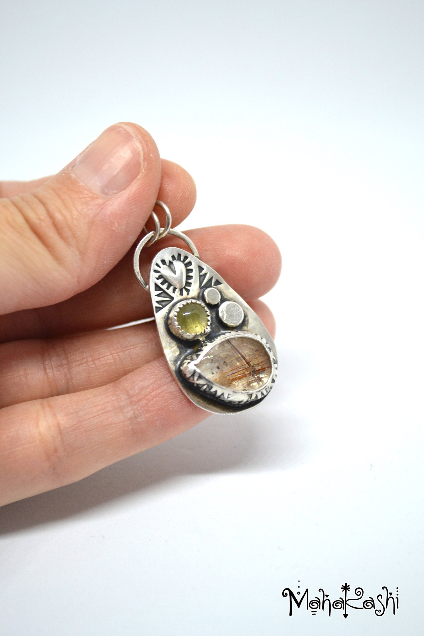 Earthly pendant with Rutilated Quartz and green Tourmaline