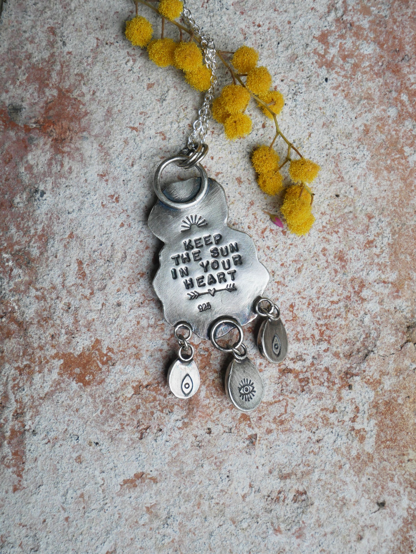 Cloud and sun pendant
