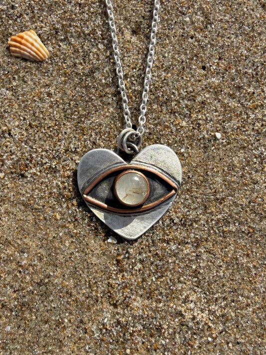 Eye heart pendant