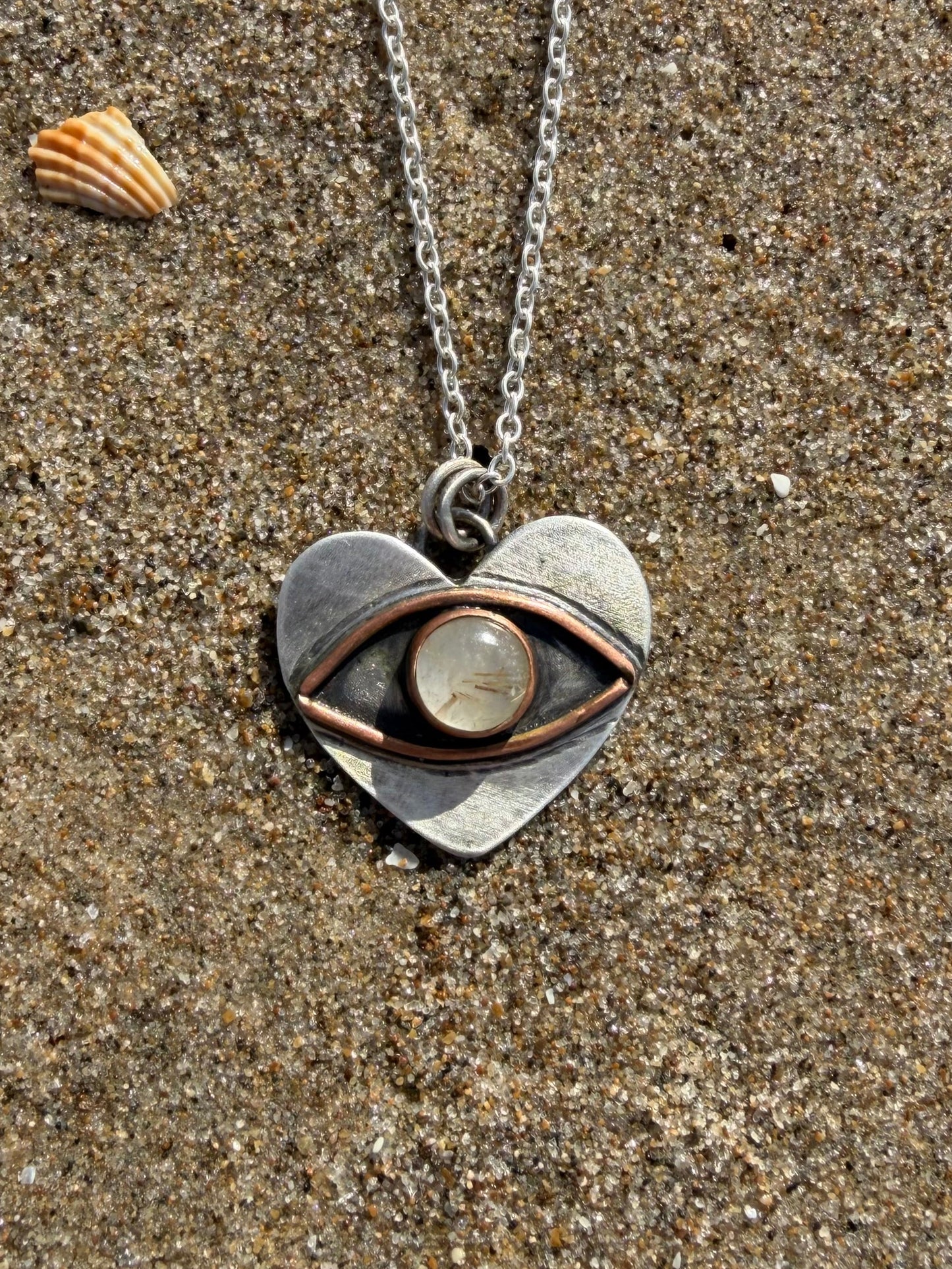 Eye heart pendant