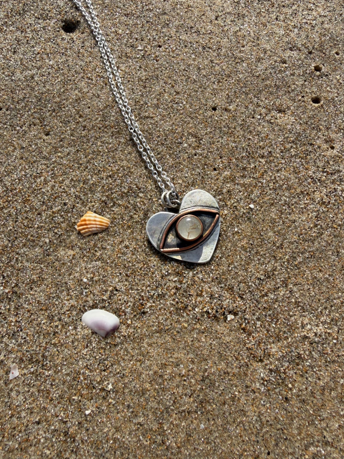 Eye heart pendant
