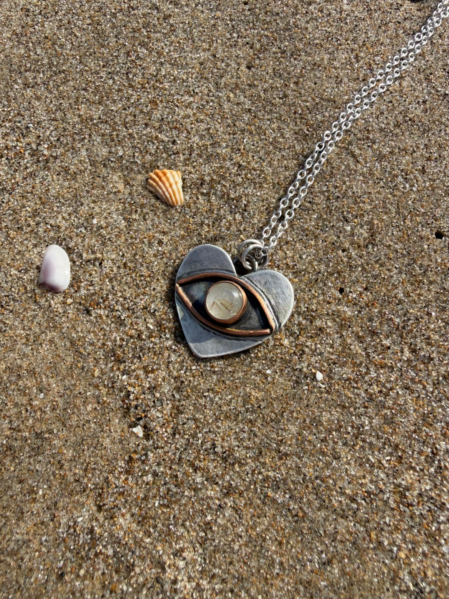 Eye heart pendant