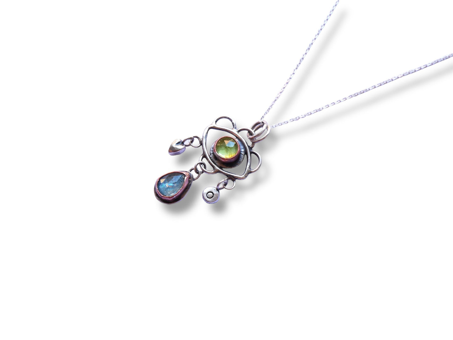 Green eye pendant