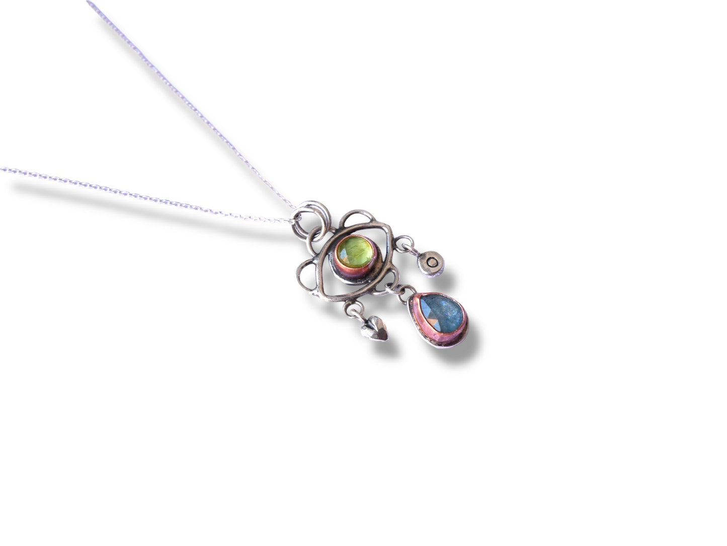 Green eye pendant