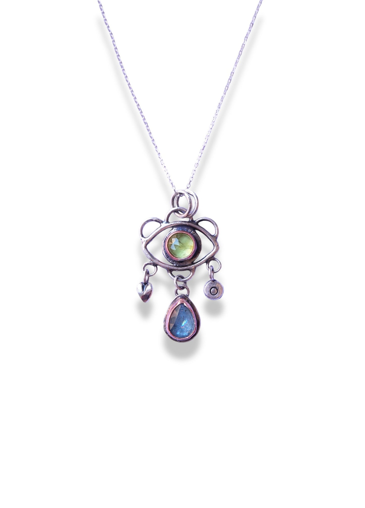 Green eye pendant