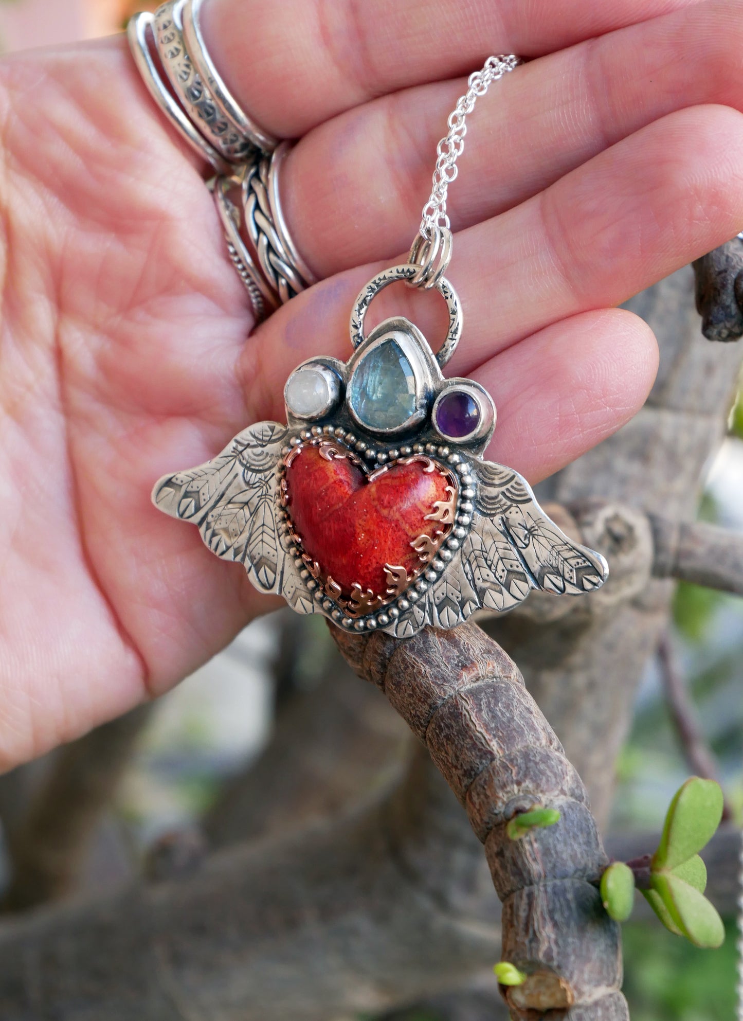 Winged heart pendant