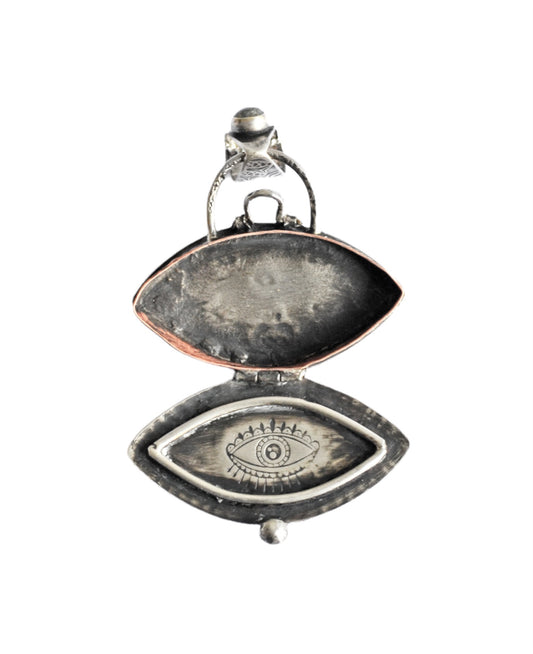 Reserved Eye locket