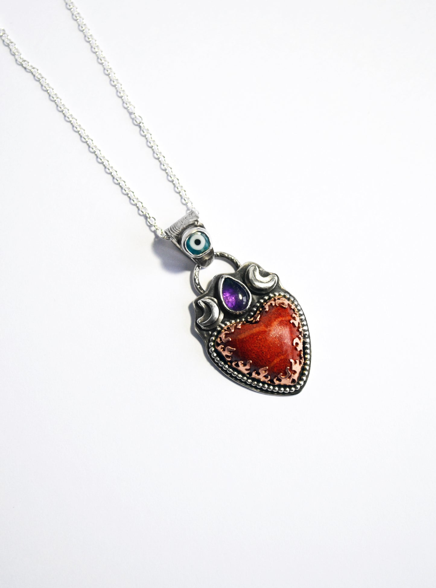 Heart dreamer pendant with Japanese Coral,Amethyst and glass evil eye