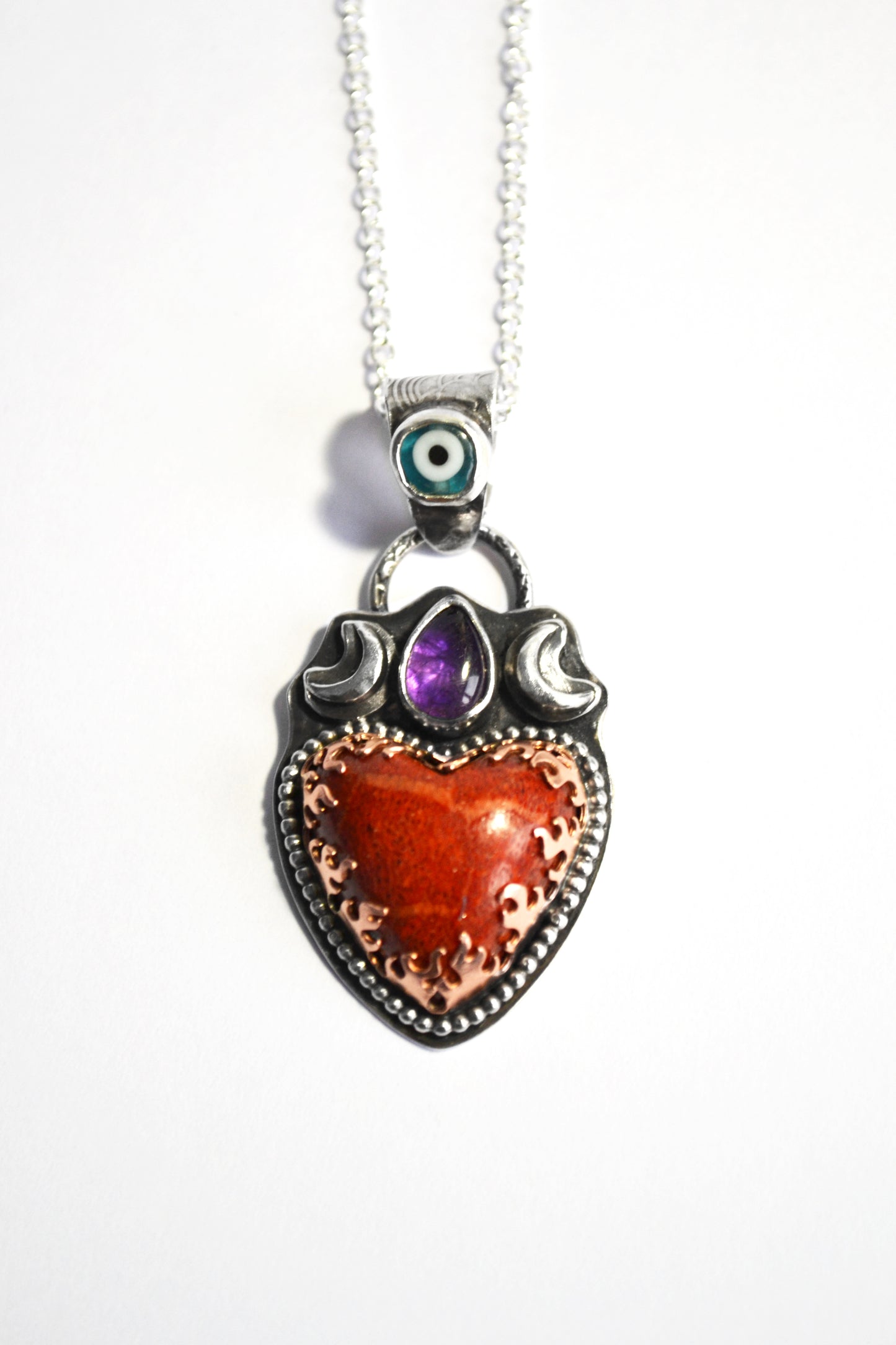 Heart dreamer pendant with Japanese Coral,Amethyst and glass evil eye