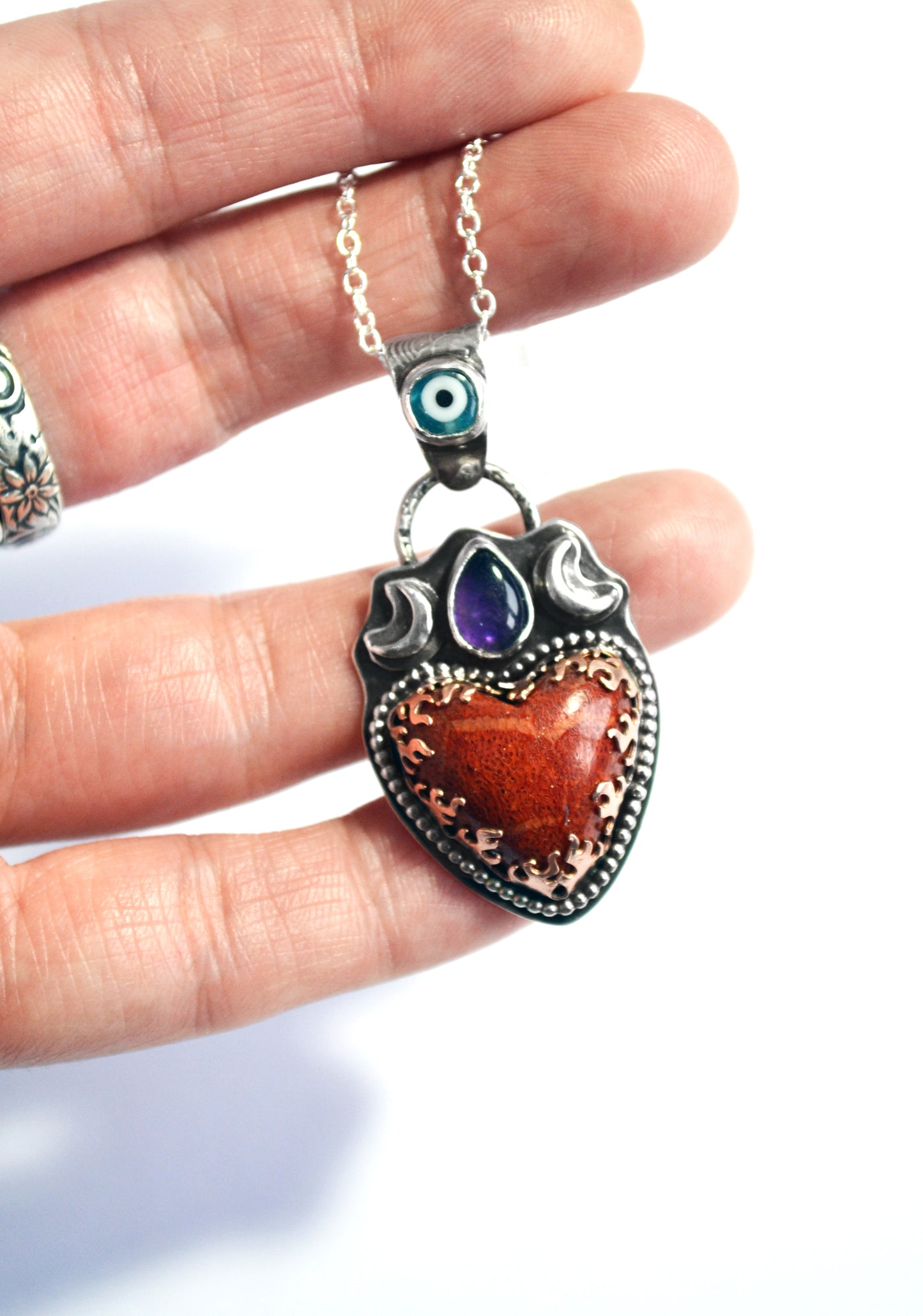 Heart dreamer pendant with Japanese Coral,Amethyst and glass evil eye